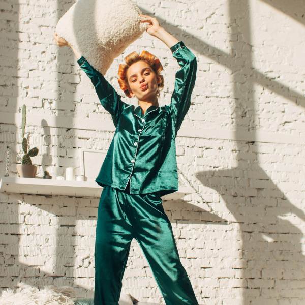 girl in green silk fabric pajamas 